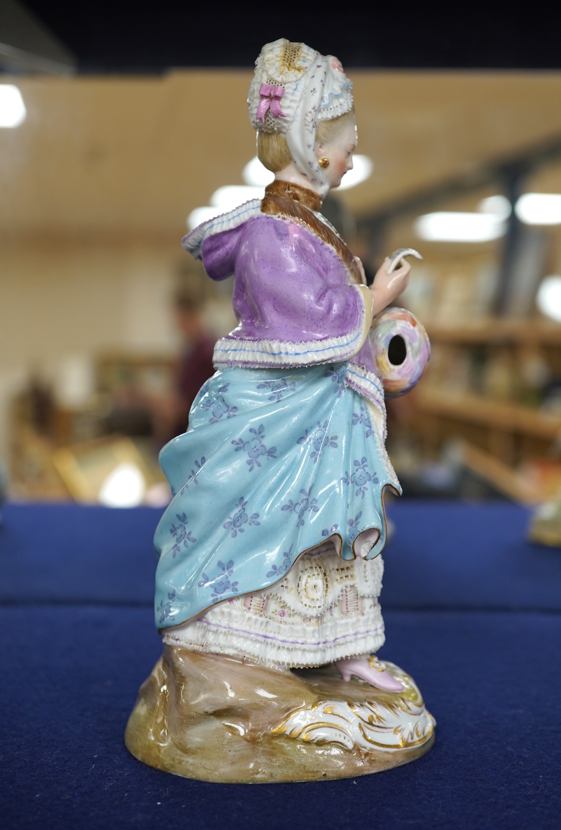 A Meissen porcelain figure, The Racegoers Companion, after Acier, incised number D66, 20cm